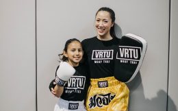 Kid with the trainer in VRTU gym